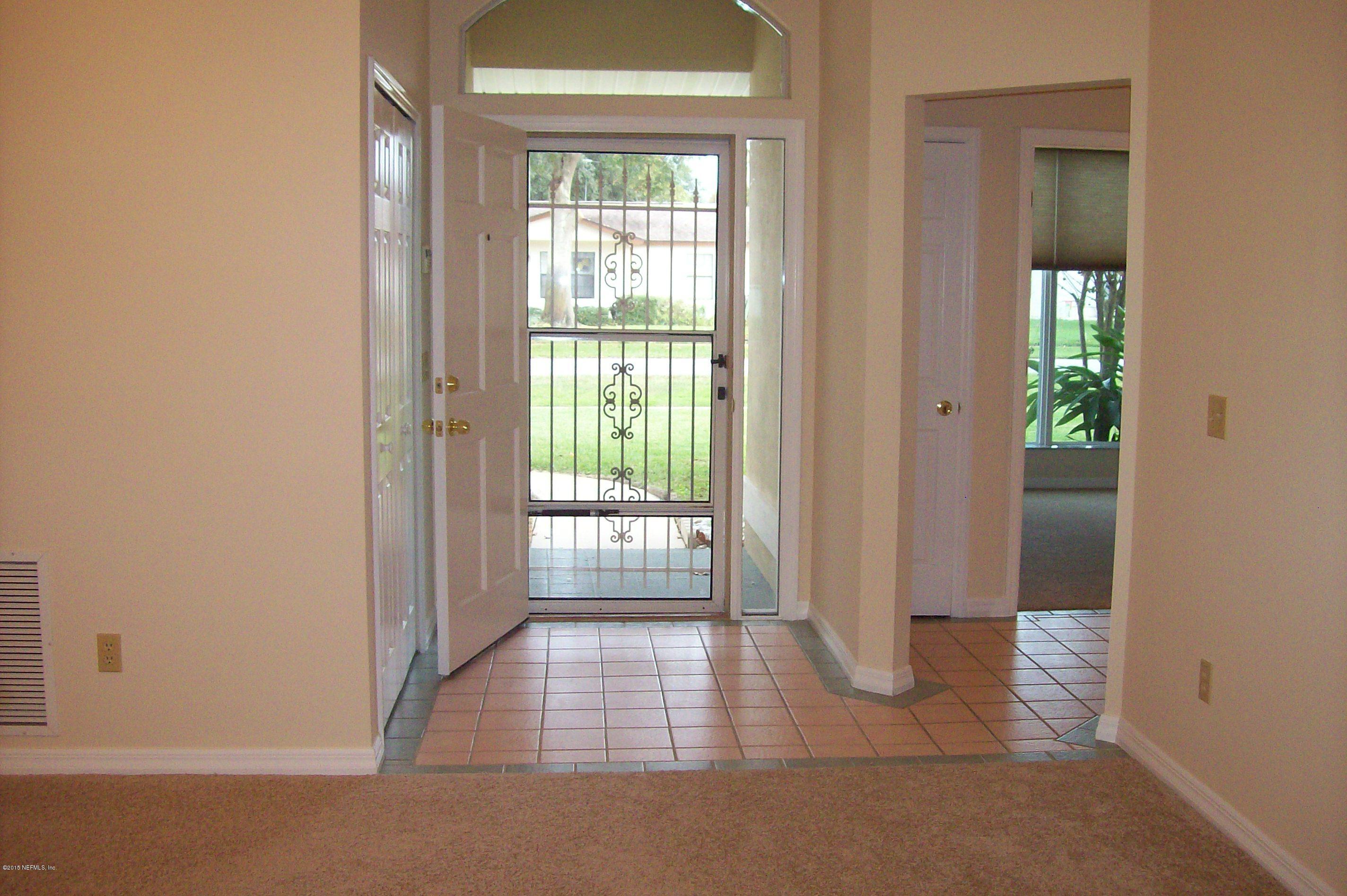131 Mariner Road St. Augustine Shores, FL 32086 - Photo 3 of 25 131 Mariner - LR to Foyer