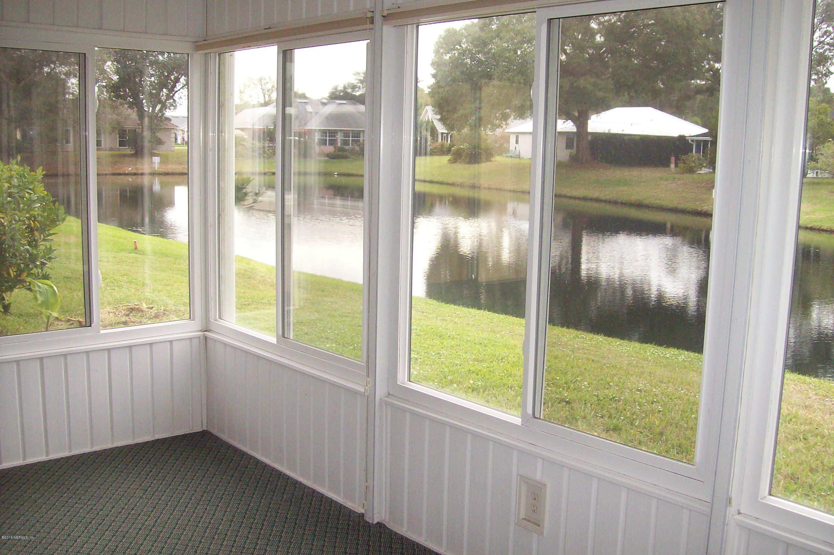 131 Mariner Road St. Augustine Shores, FL 32086 - Photo 7 of 25 131 Mariner - Glass Enclosed Porch
