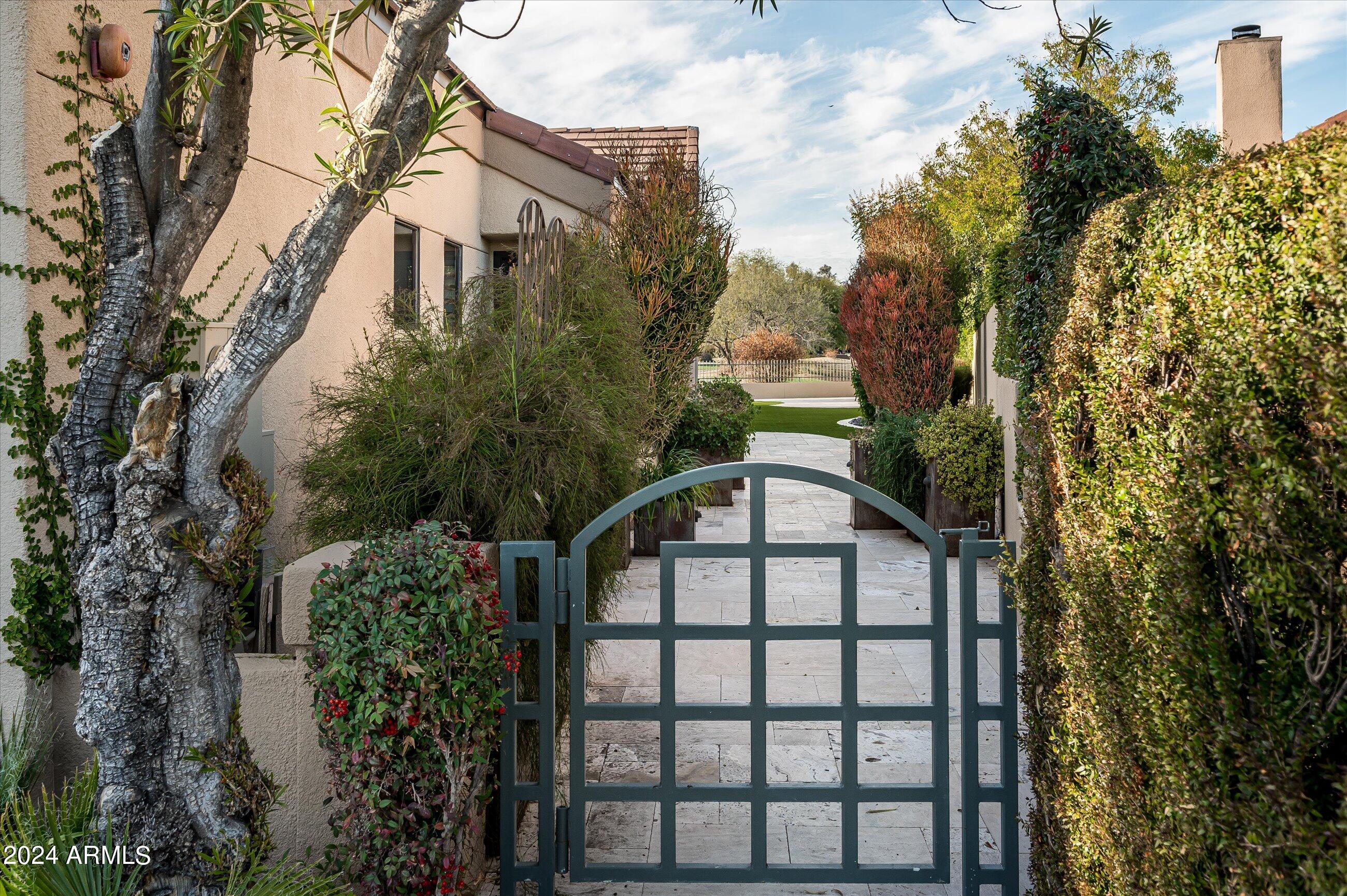 7740 East Gainey Ranch Road, Unit 9 Scottsdale, AZ 85258 - Photo 5 of 55 Gate Courtyard Entry