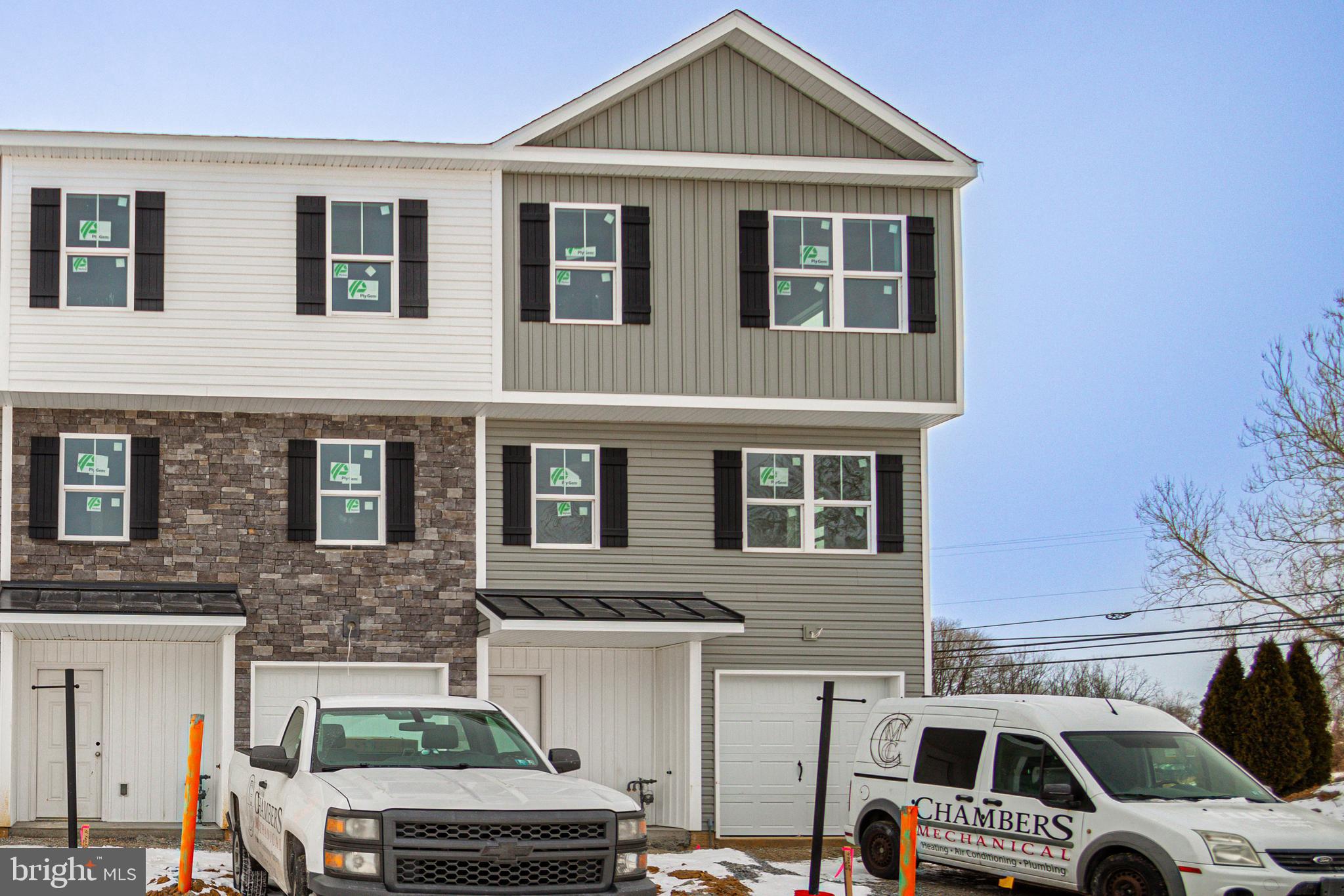 1 Landing Place, Unit 1 York, PA 17408 - Photo 1 of 35 a front view of a building with parking space