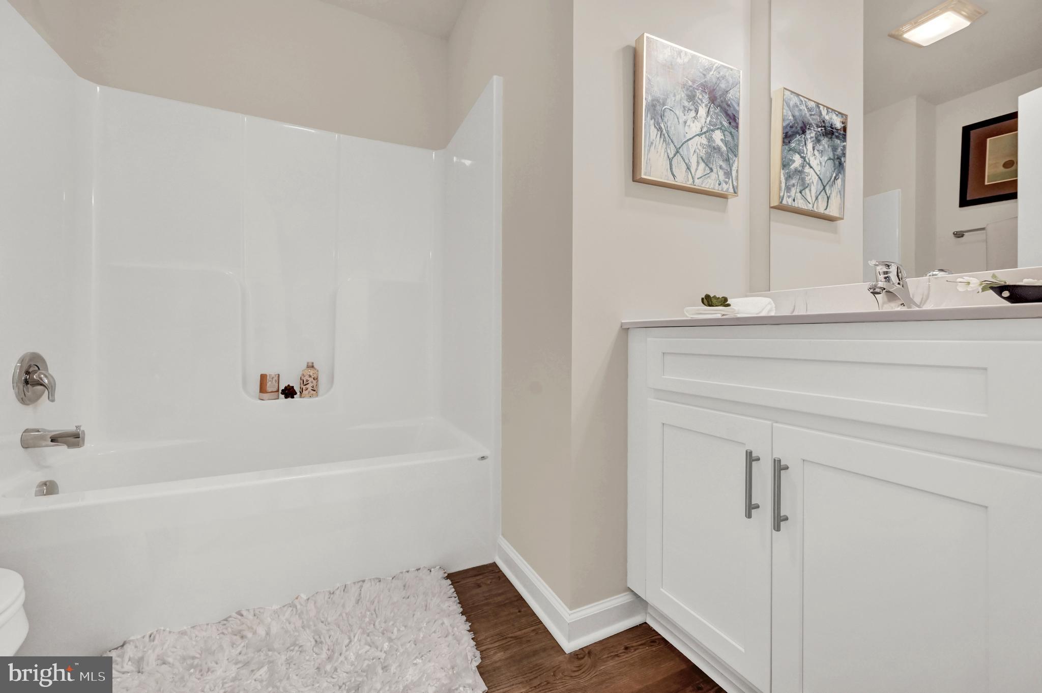 1 Landing Place, Unit 1 York, PA 17408 - Photo 26 of 35 a bathroom with a bathtub and a sink
