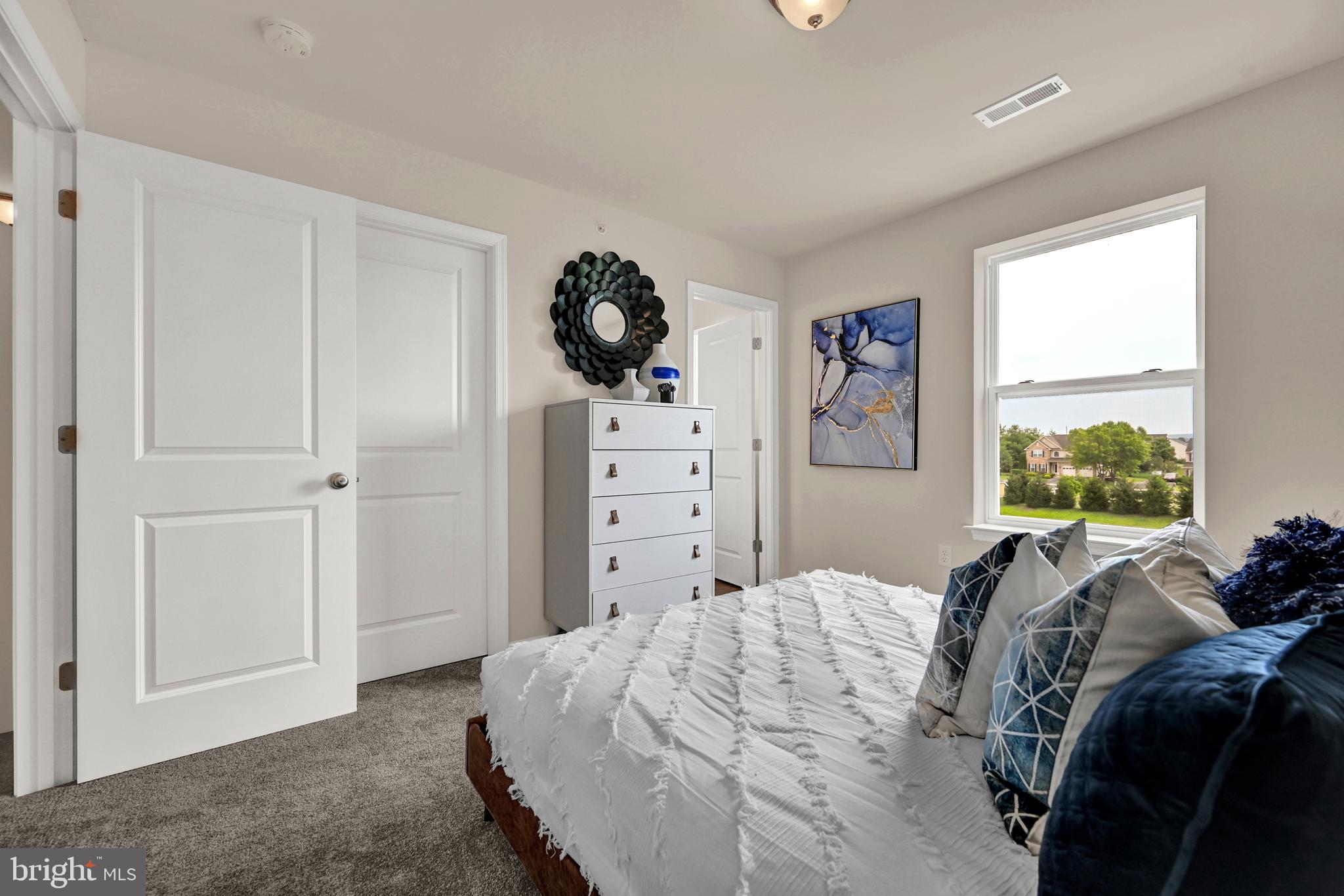 1 Landing Place, Unit 1 York, PA 17408 - Photo 28 of 35 a bedroom with a bed and a window