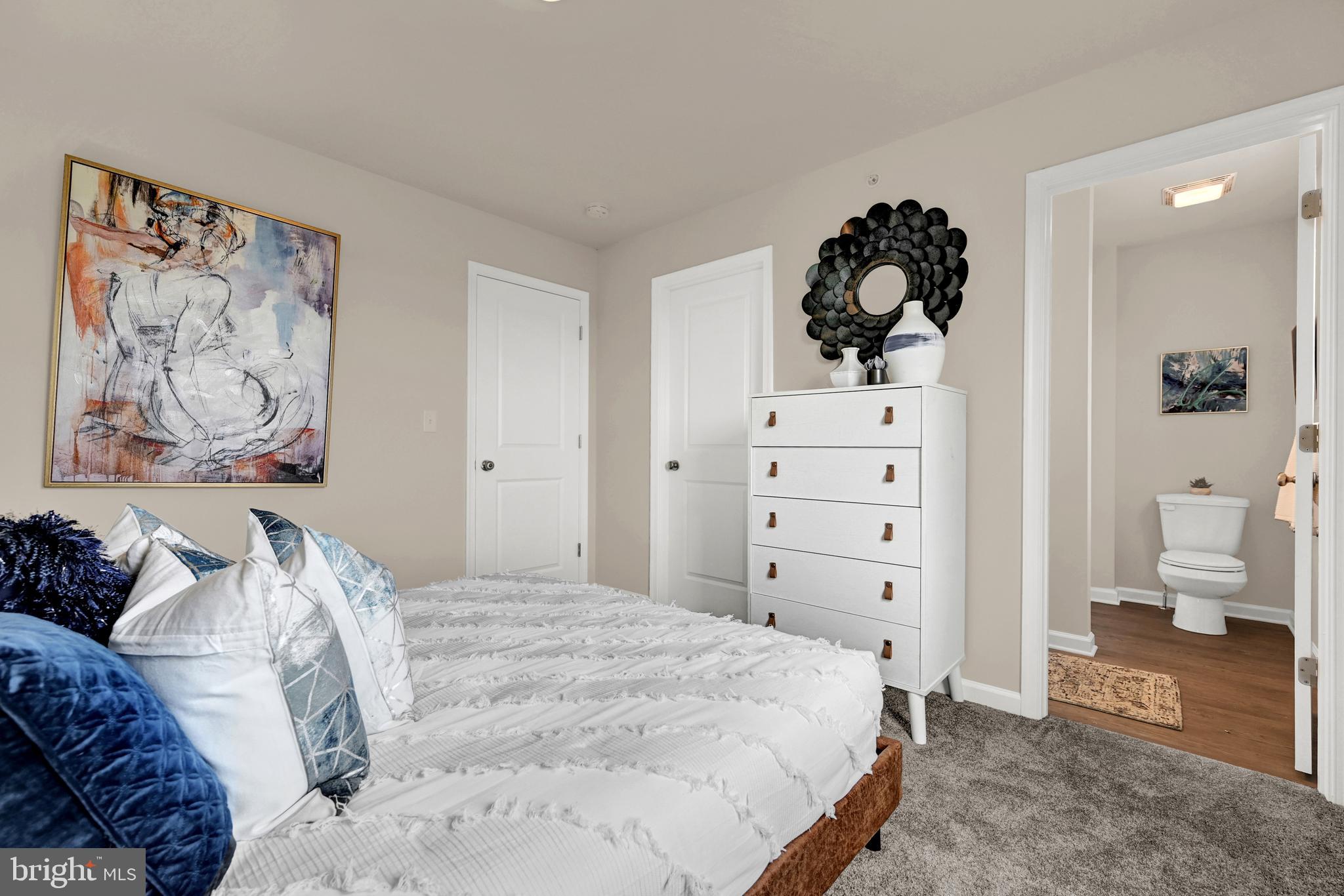 1 Landing Place, Unit 1 York, PA 17408 - Photo 29 of 35 a bedroom with a bed and cabinets