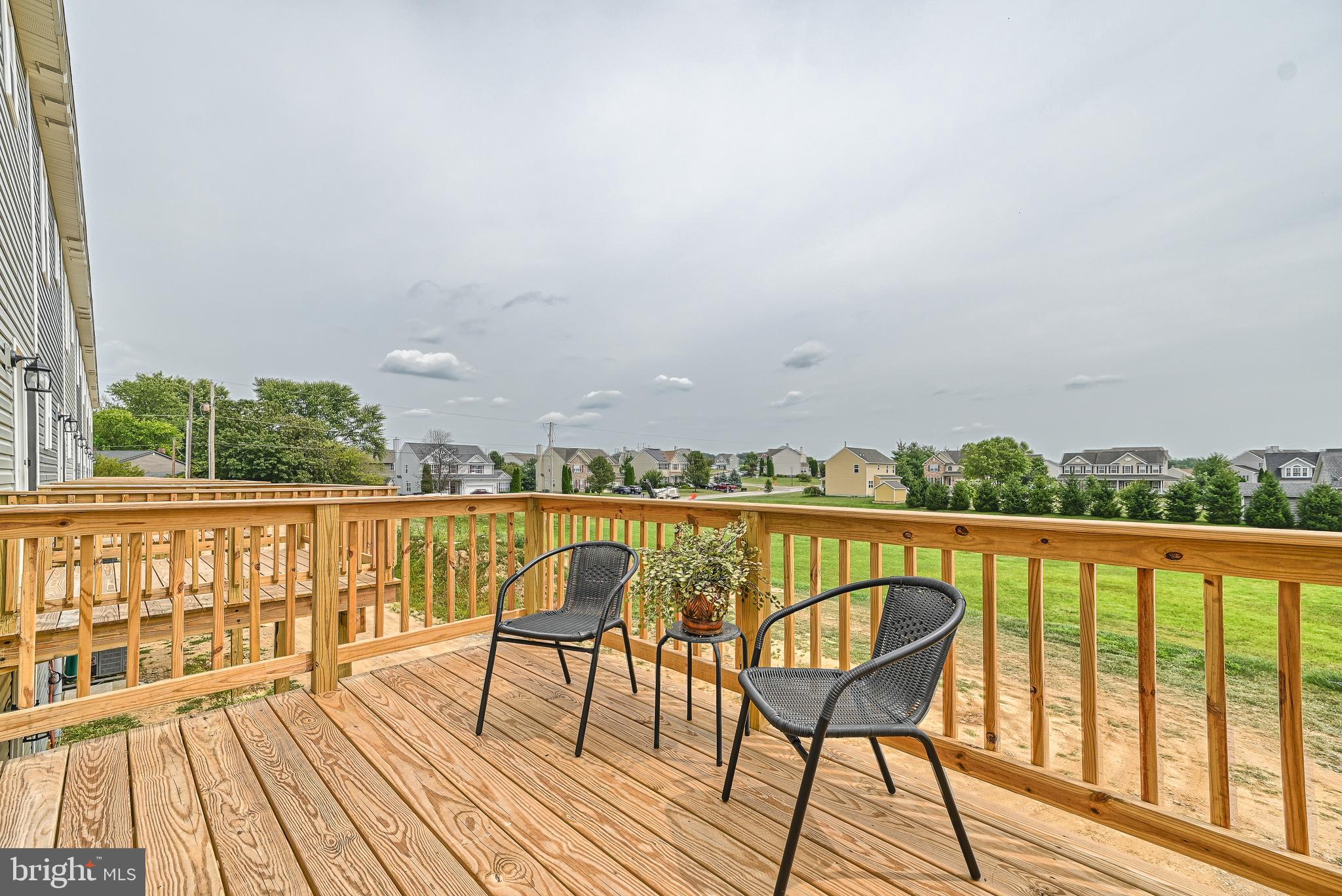 1 Landing Place, Unit 1 York, PA 17408 - Photo 31 of 35 a view of balcony with furniture and wooden floor
