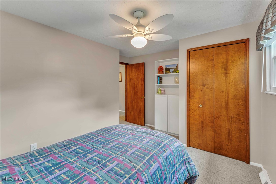 4090 Ridgeview Road Cleveland, OH 44144 - Photo 23 of 40 Carpeted bedroom featuring a closet and ceiling fan