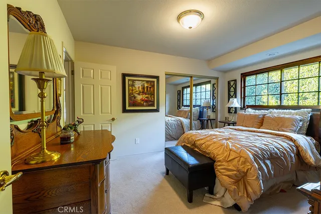 a bed room with a bed and a couch