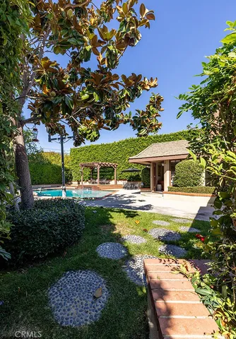 a view of a roof deck with wooden floor and fence