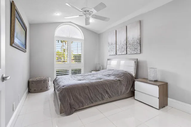 an aerial view of a house with a yard and garden