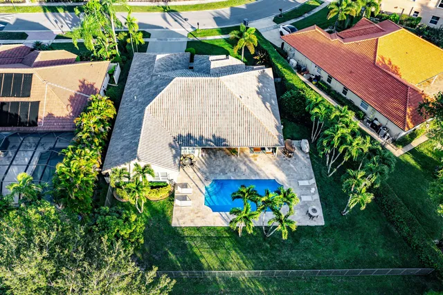 a view of a swimming pool with a garden