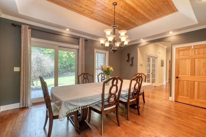 115 Dawsons Lane Murphy, NC 28906 - Photo 16 of 93 a view of a dining room with furniture window and wooden floor