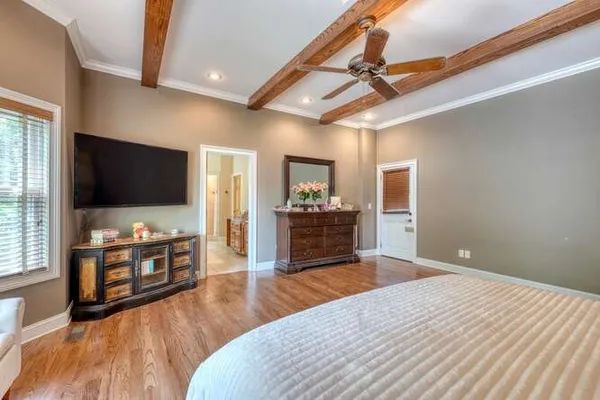 a view of living room with furniture and a fireplace