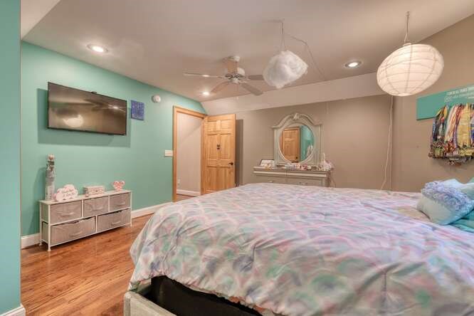 115 Dawsons Lane Murphy, NC 28906 - Photo 30 of 93 a spacious bedroom with a bed and a flat screen tv