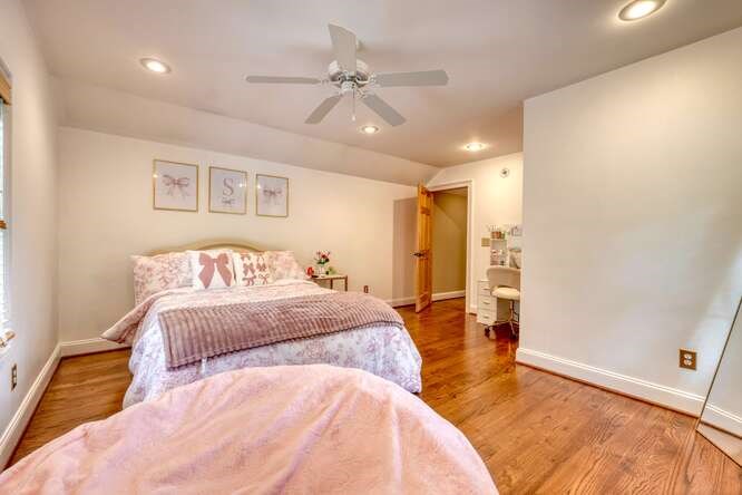 115 Dawsons Lane Murphy, NC 28906 - Photo 32 of 93 a spacious bedroom with a bed and ceiling fan
