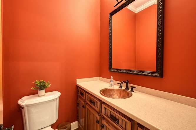115 Dawsons Lane Murphy, NC 28906 - Photo 56 of 93 a bathroom with a sink a toilet and a mirror