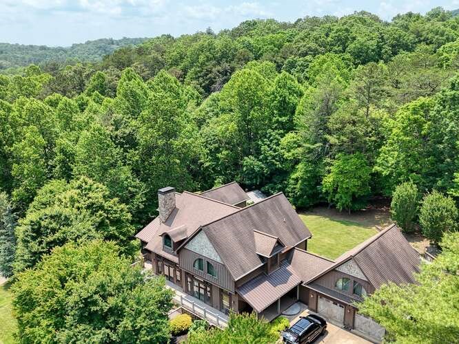 115 Dawsons Lane Murphy, NC 28906 - Photo 82 of 93 an aerial view of a house with a garden and trees