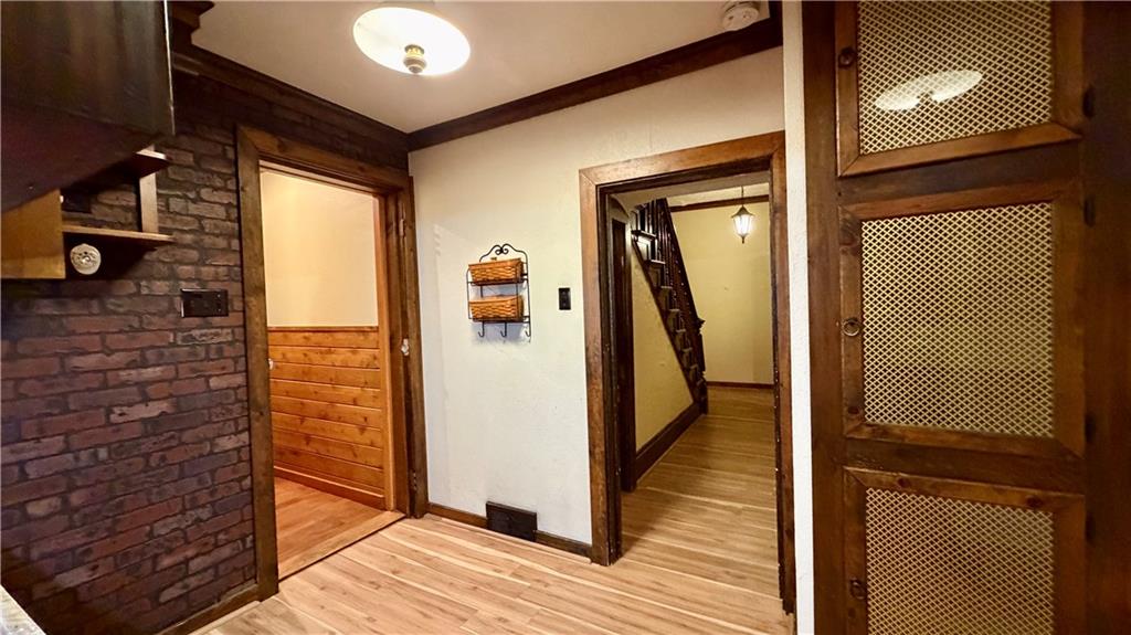 1425 Freeport Road Cheswick, PA 15024 - Photo 13 of 45 VIEW FROM KITCHEN SHOWING SPACIOUS PANTRY, LEFT TO FULL BATH AND FAMILY ROOM AND CENTER HALLWAY STRAIGHT AHEAD!