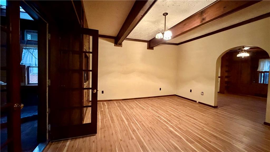 1425 Freeport Road Cheswick, PA 15024 - Photo 17 of 45 HUGE 16X15 LIVING ROOM WITH WOOD BEAMS AND FRENCH DOOR LEADING TO DEN/OFFICE!