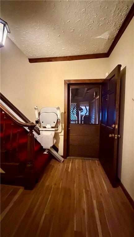 1425 Freeport Road Cheswick, PA 15024 - Photo 26 of 45 CENTER HALLWAY WITH 2ND ENTRY TO CLOSED IN SUNROOM. STAIRWAY LIFT CHAIR STAYS.