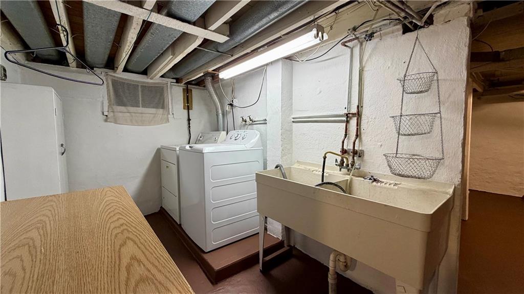 1425 Freeport Road Cheswick, PA 15024 - Photo 35 of 45 11X7 LAUNDRY ROOM WITH HINGED FOLDING TABLE, DOUBLE LAUNDRY SINK AND WASHER/DRYER!