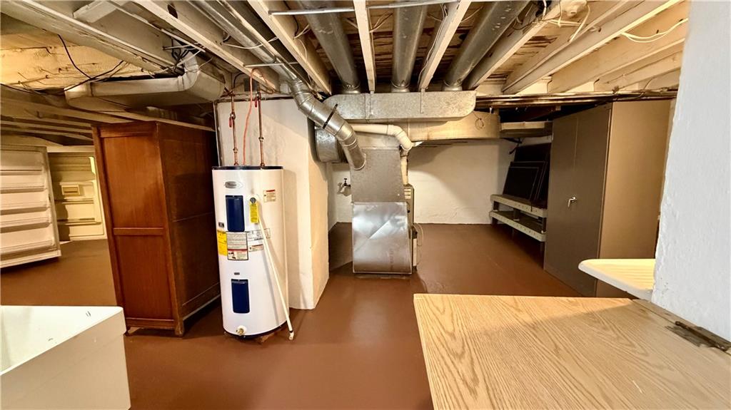 1425 Freeport Road Cheswick, PA 15024 - Photo 36 of 45 THIS 19X14 BASEMENT UTILITY ROOMS OFFERS A TON OF SPACE FOR STORAGE AND WORKBENCH!