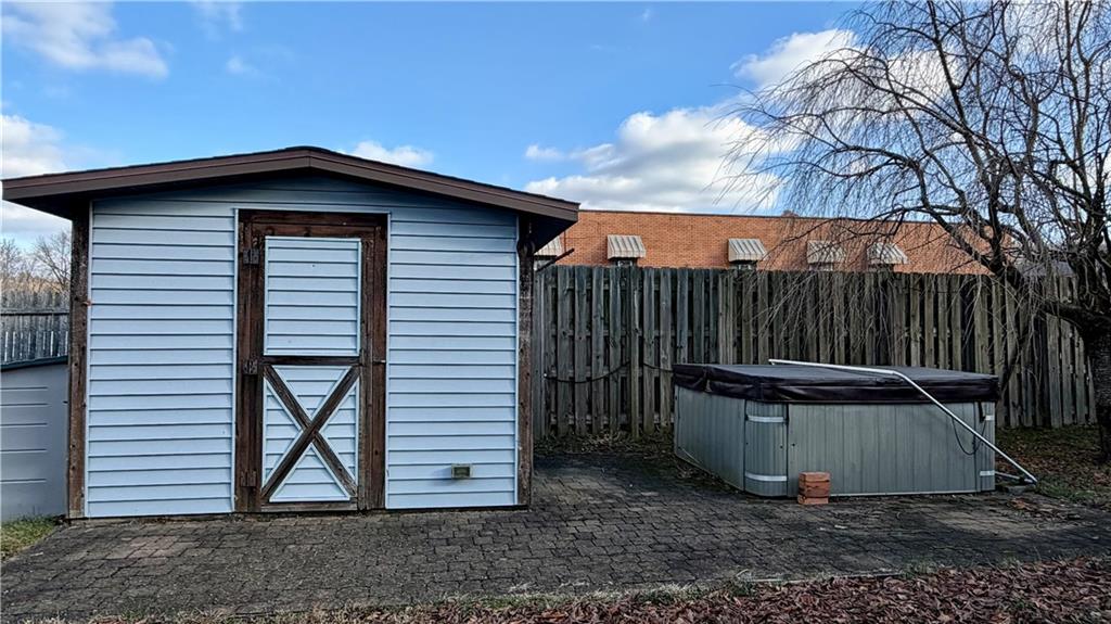 1425 Freeport Road Cheswick, PA 15024 - Photo 42 of 45 STORAGE SHED MATCHES THE HOUSE! HOT TUB IS INCLUDED, BUT IT NEEDS HOOKED UP TO ELECTRIC. BEING SOLD AS-IS AS THE CURRENT OWNER HAS NEVER USED IT.
