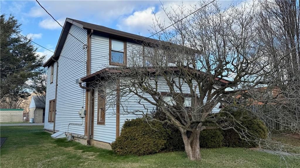 1425 Freeport Road Cheswick, PA 15024 - Photo 43 of 45 SIDE OF HOME. NICELY LANDSCAPED WITH MATURE TREES!