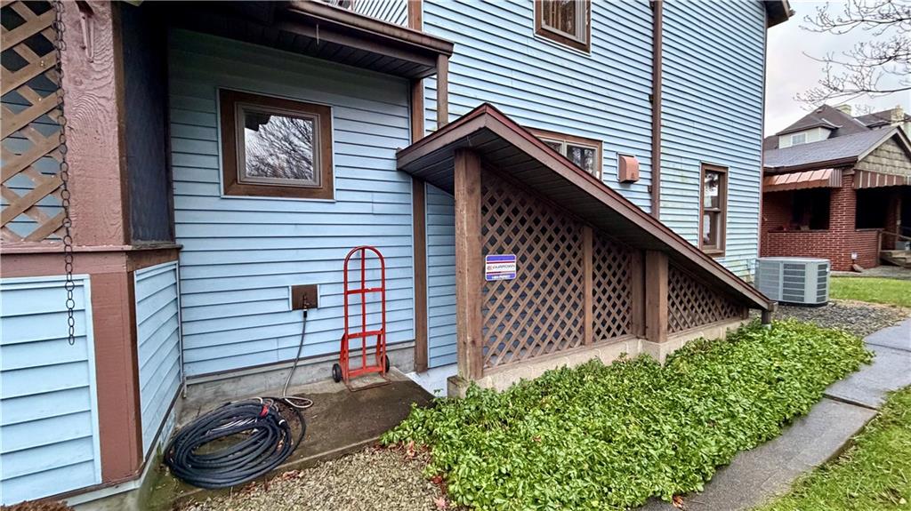 1425 Freeport Road Cheswick, PA 15024 - Photo 45 of 45 ENTRY TO BASEMENT FROM EXTERIOR! NICELY COVERED FROM THE ELEMENTS!