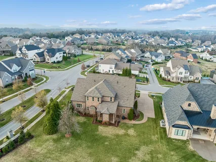 an aerial view of a house with a garden