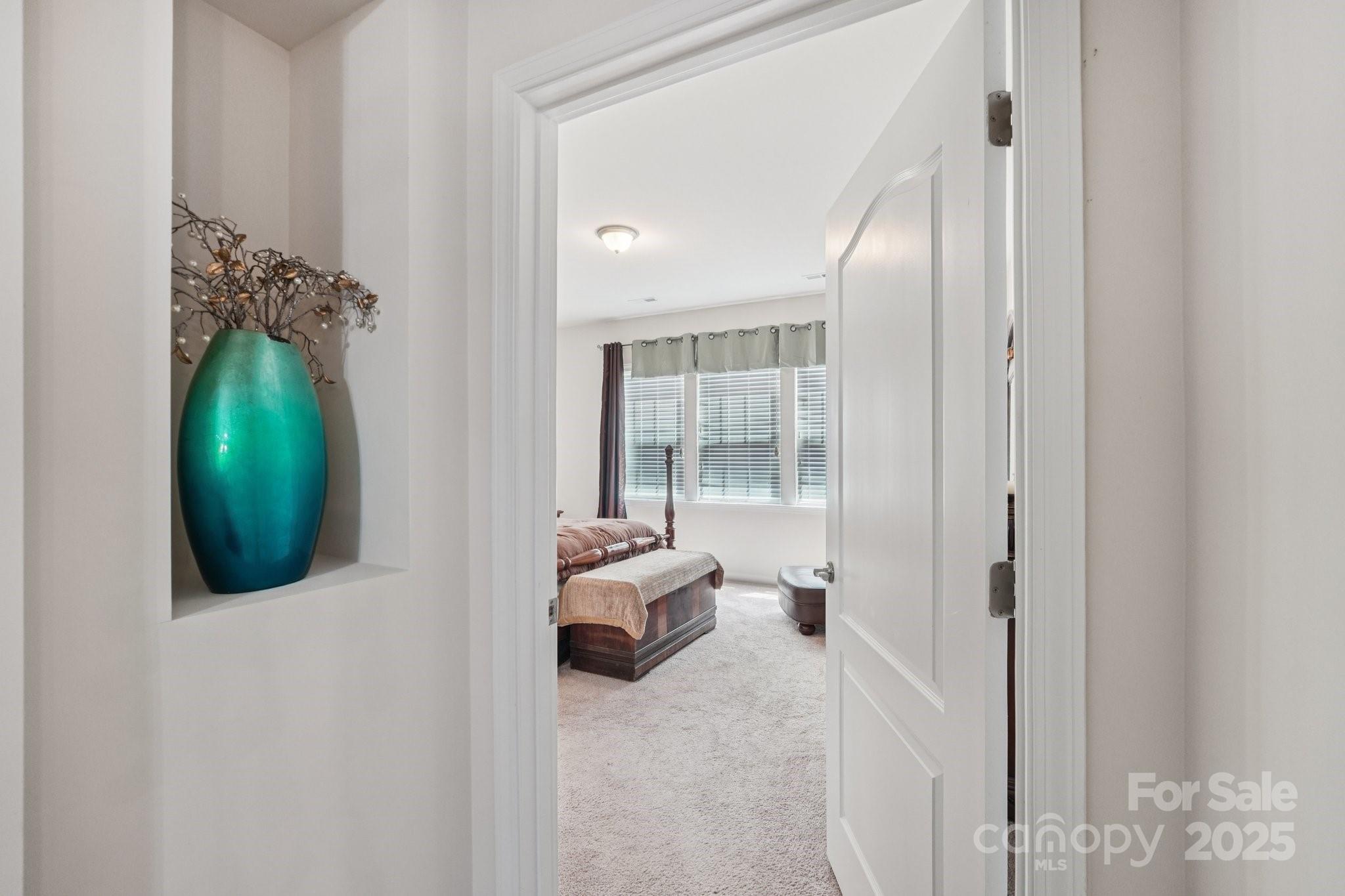 8058 Asher Chase Trail Lancaster, SC 29720 - Photo 15 of 48 a living room with furniture and a chandelier