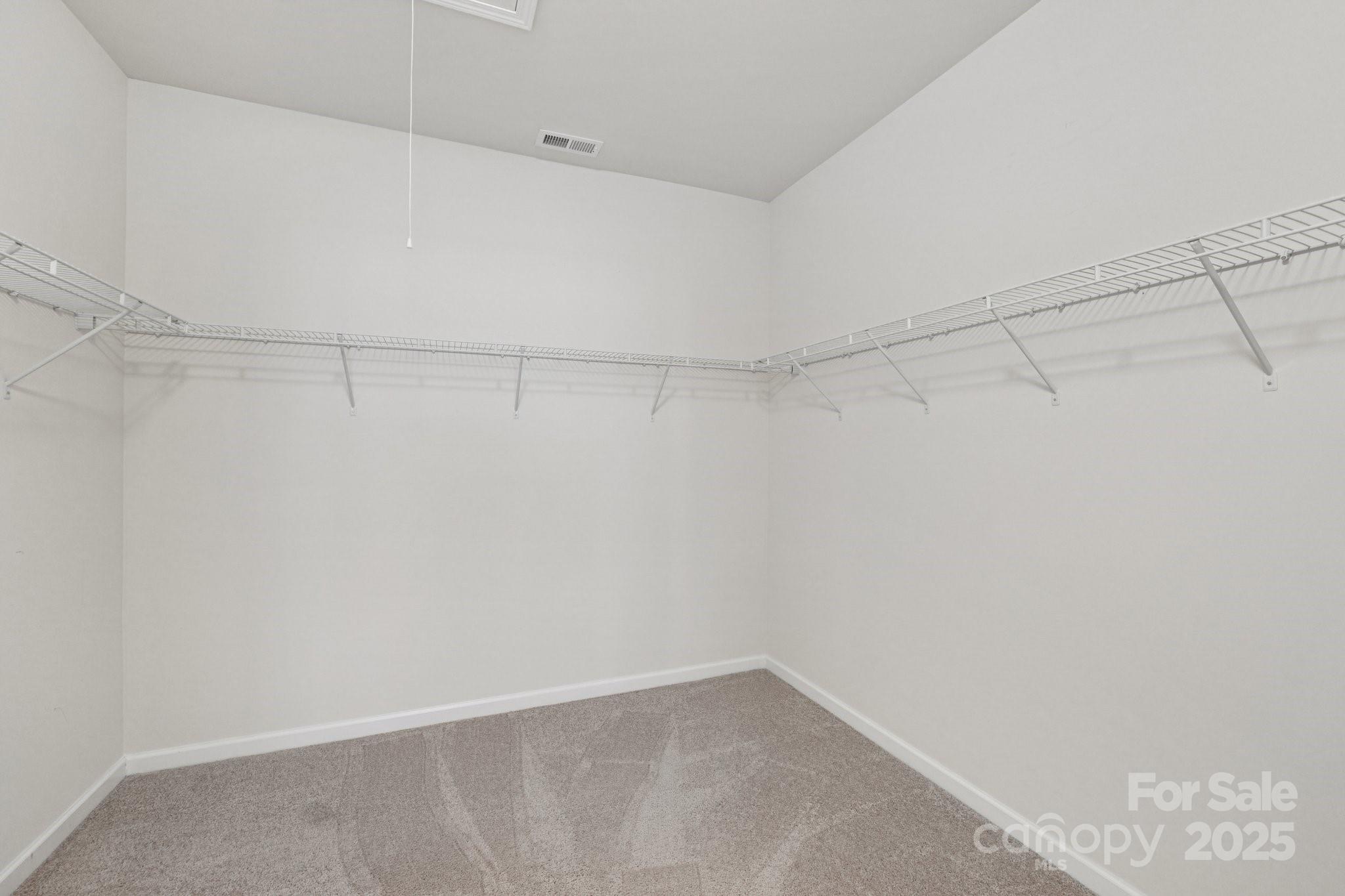 8058 Asher Chase Trail Lancaster, SC 29720 - Photo 20 of 48 a view of a room with racks on the wall