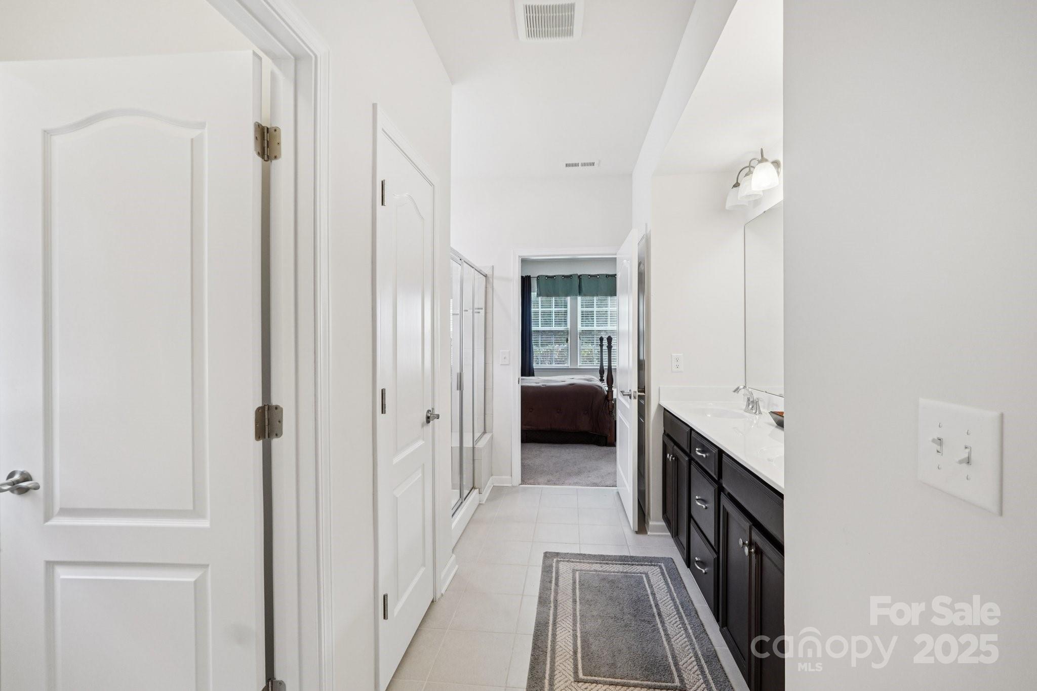 8058 Asher Chase Trail Lancaster, SC 29720 - Photo 21 of 48 a view of a hallway with a wooden floors