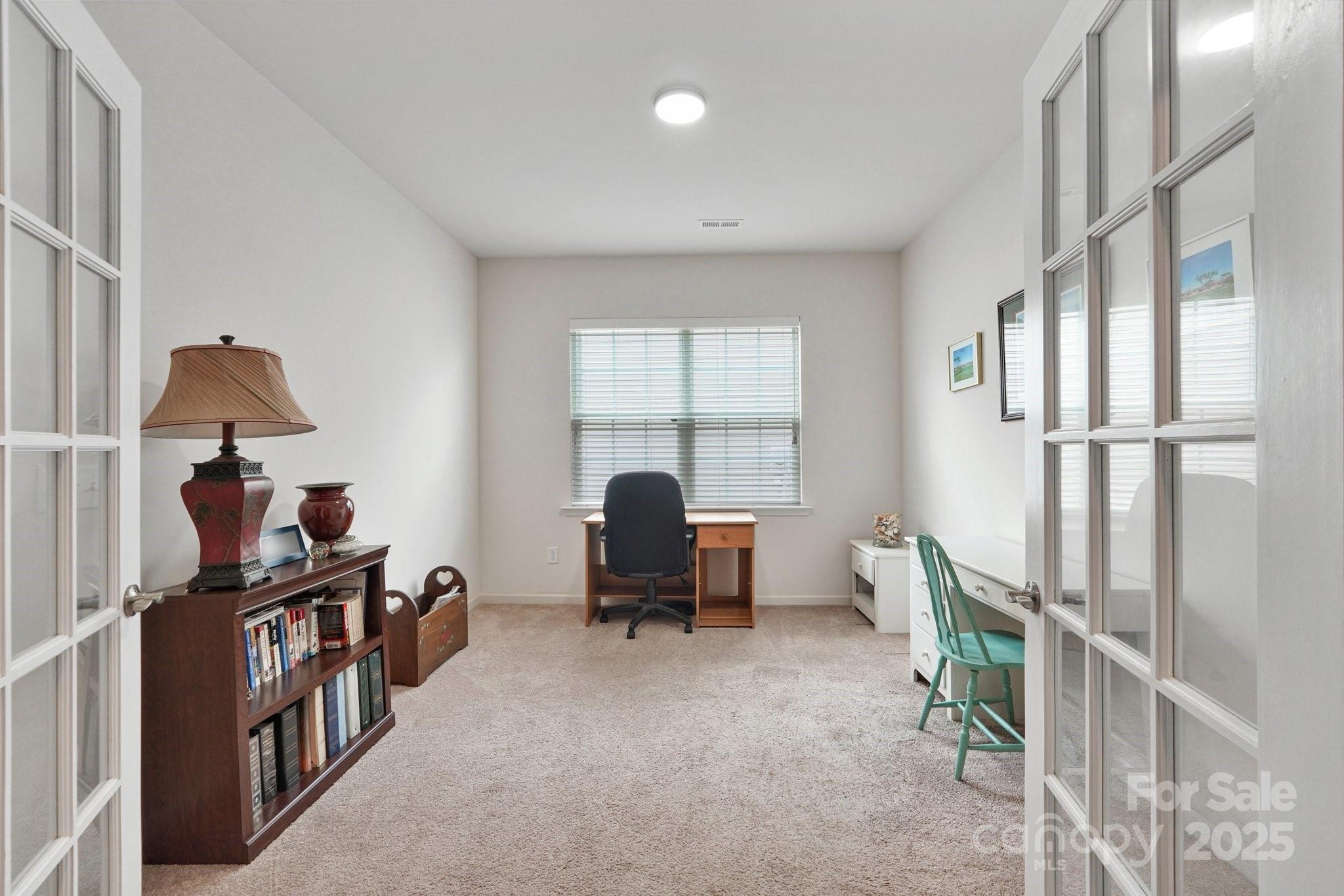8058 Asher Chase Trail Lancaster, SC 29720 - Photo 22 of 48 a living room with furniture and a window