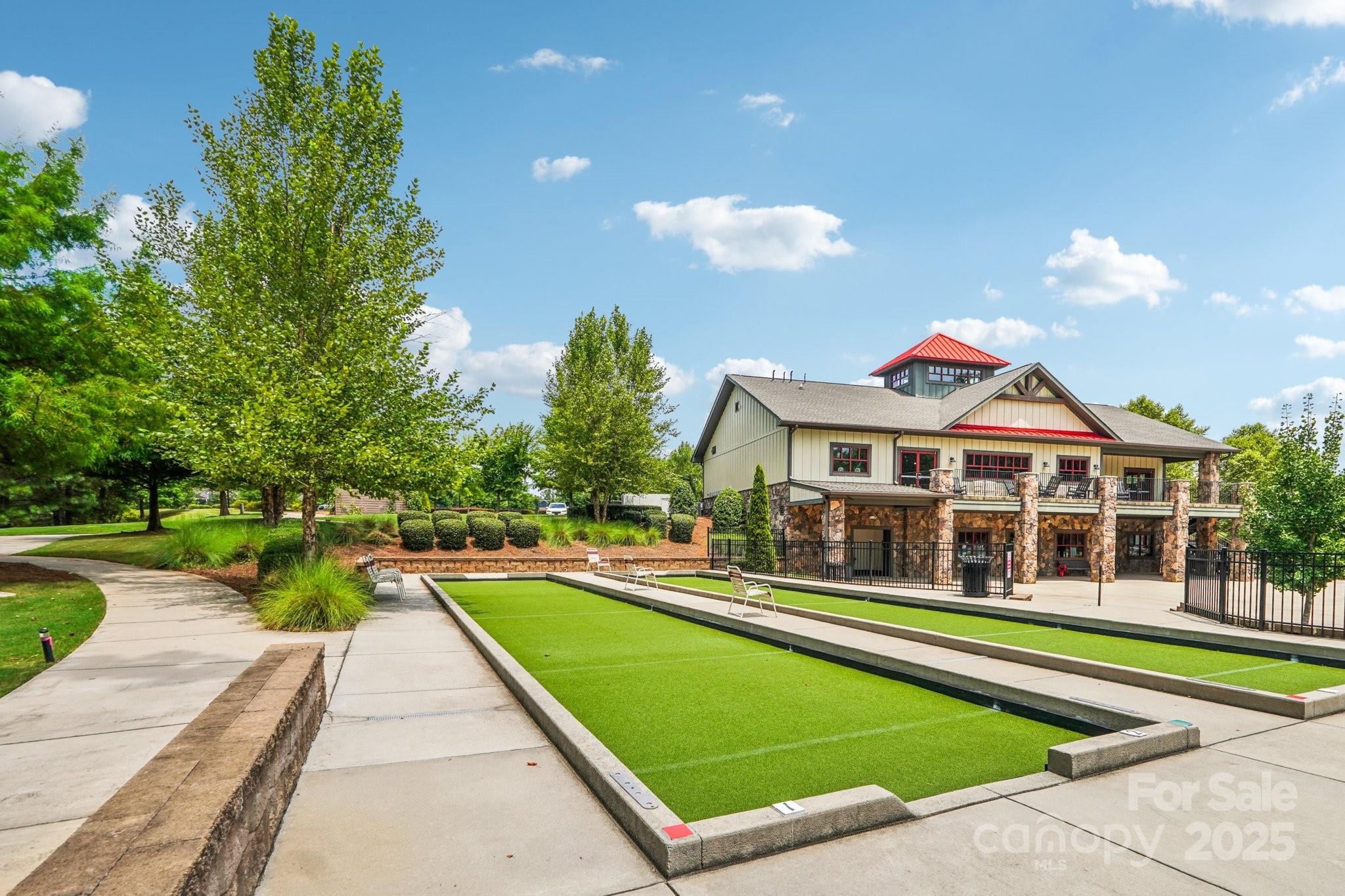 8058 Asher Chase Trail Lancaster, SC 29720 - Photo 44 of 48 a view of a house with pool and chairs