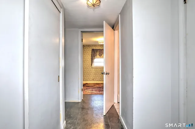 a view of an empty room and window