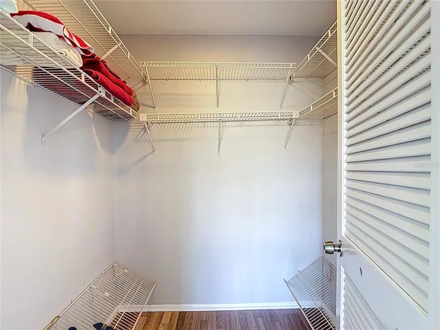 a kitchen with a sink stove and microwave