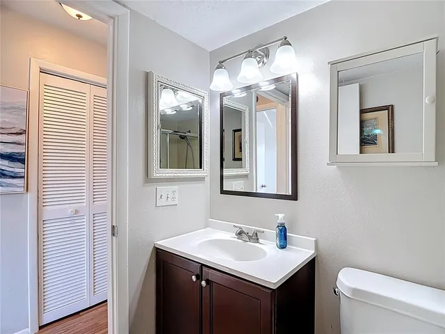 a view of grassy field with trees