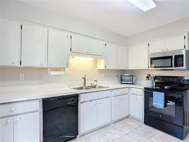 a view of parking area and car parked