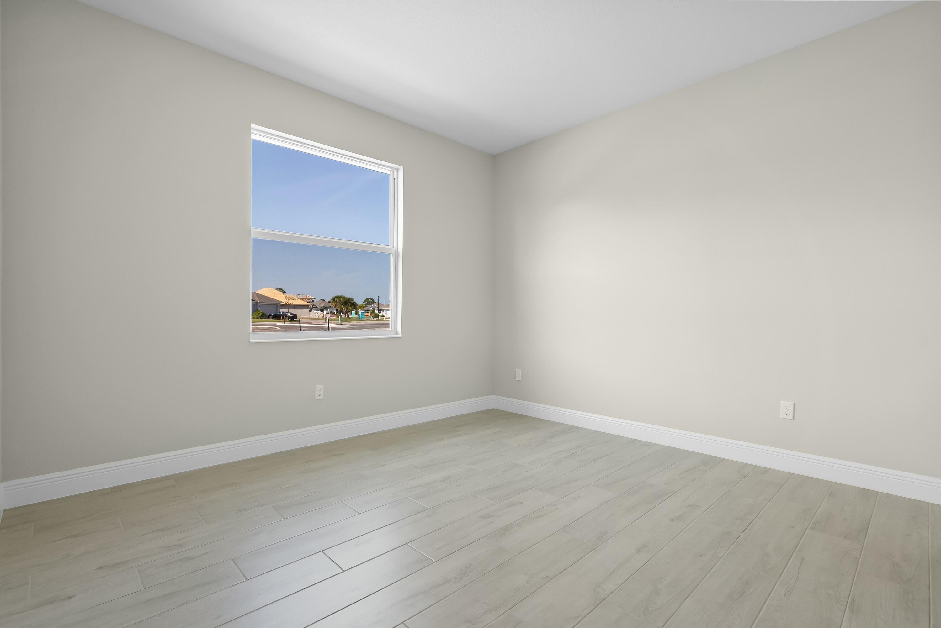 6382 High Pointe Circle Vero Beach, FL 32967 - Photo 36 of 55 an empty room with a window