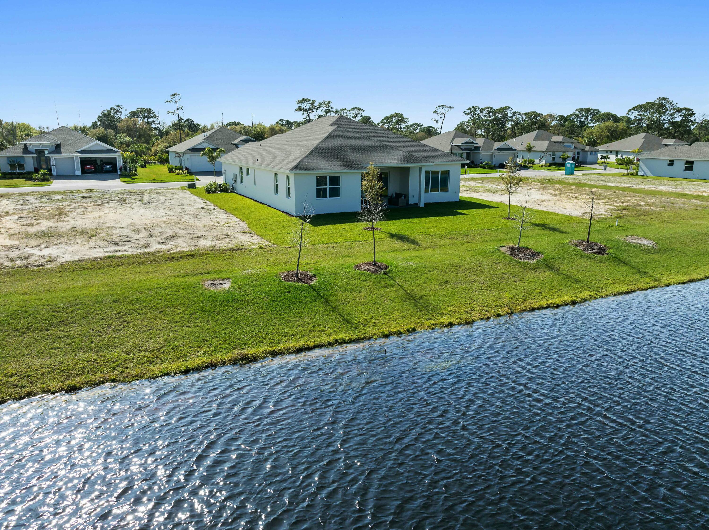 6382 High Pointe Circle Vero Beach, FL 32967 - Photo 49 of 55 a view of a house with a yard