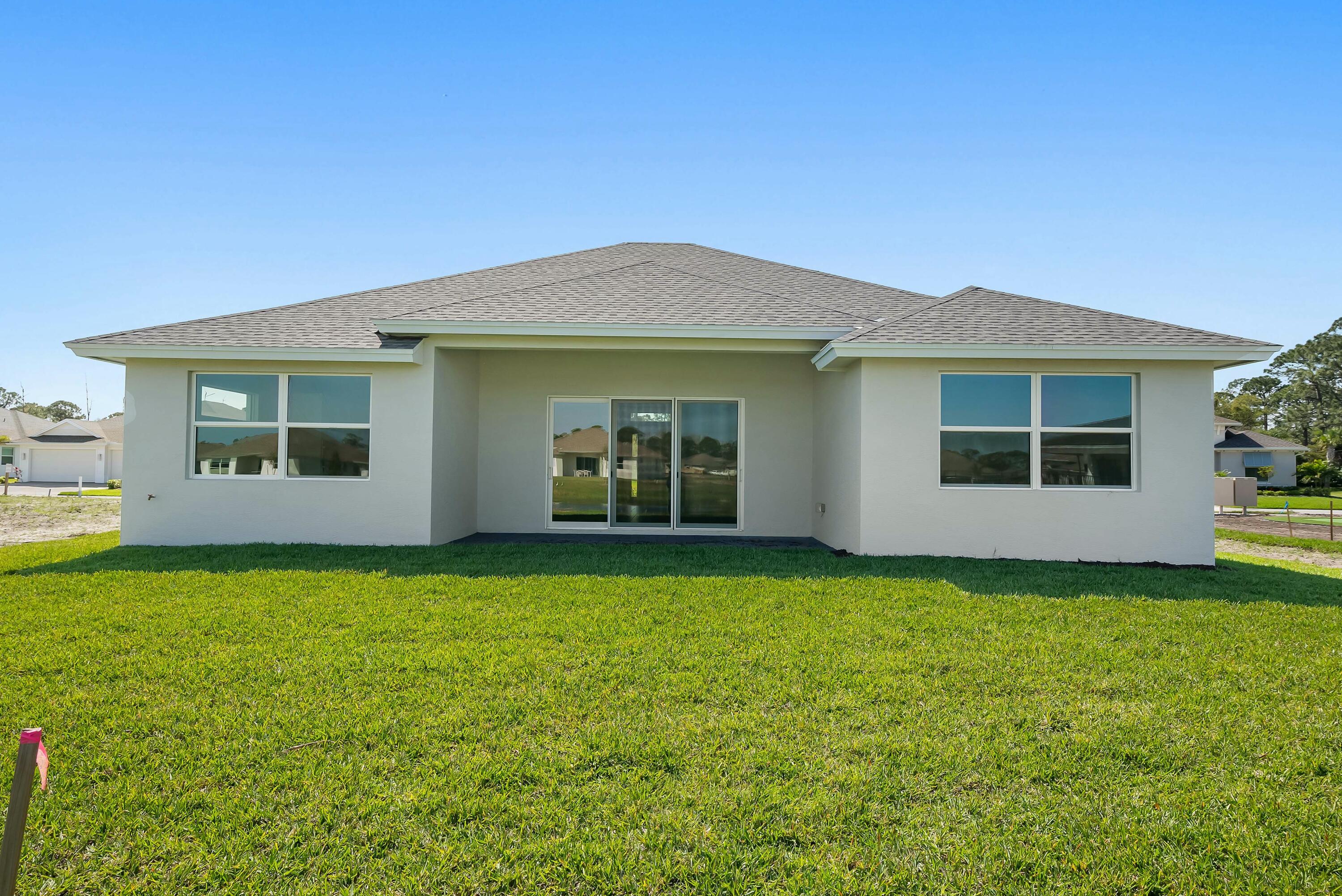 6382 High Pointe Circle Vero Beach, FL 32967 - Photo 52 of 55 a view of a house with a backyard
