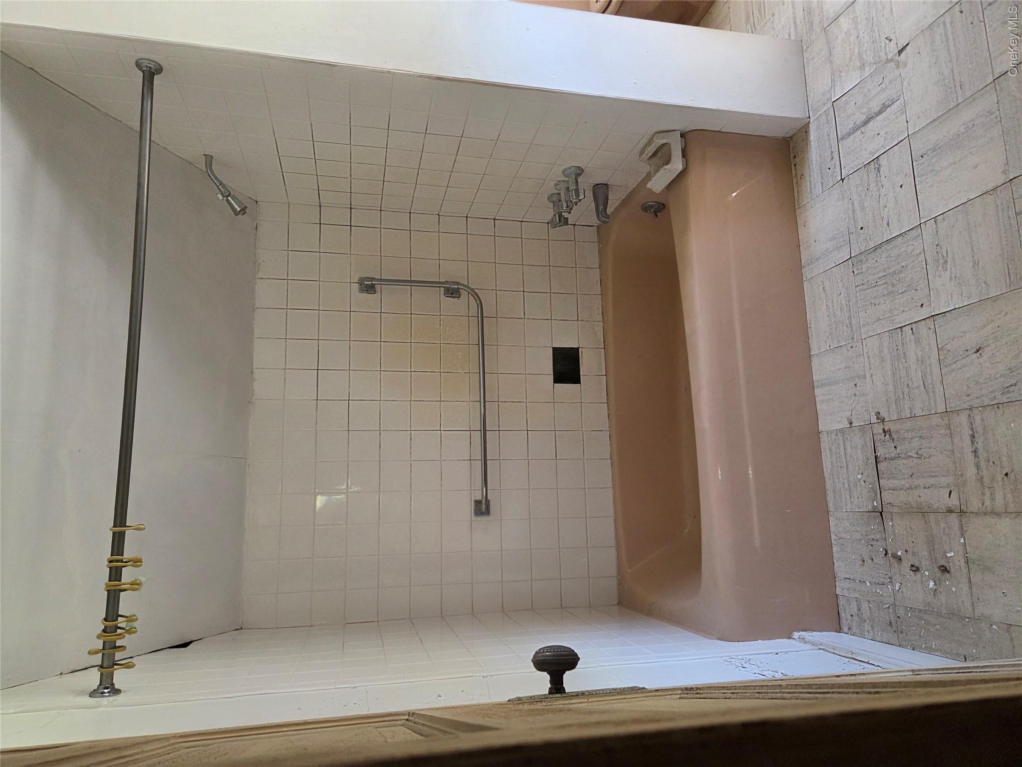 125 Zimmerman Road Loch Sheldrake, NY 12759 - Photo 30 of 43 a bathroom with a bathtub