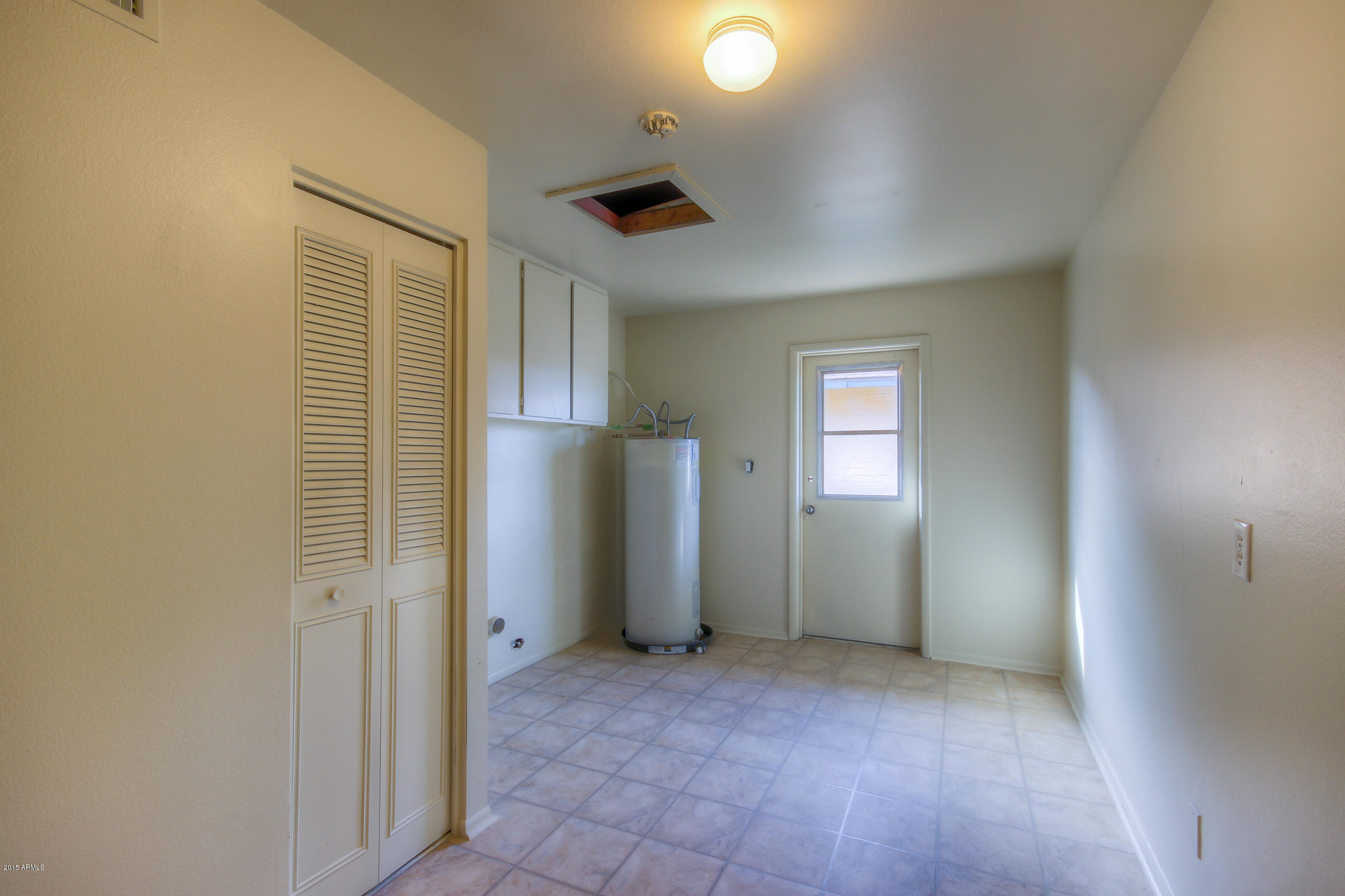 3939 West Bethany Home Road Phoenix, AZ 85019 - Photo 24 of 36 Laundry Room and Garage (1)