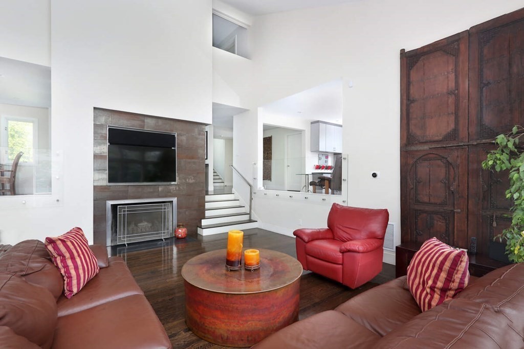 9 Avondale Road Newton, MA 02459 - Photo 7 of 23 a living room with furniture and a flat screen tv
