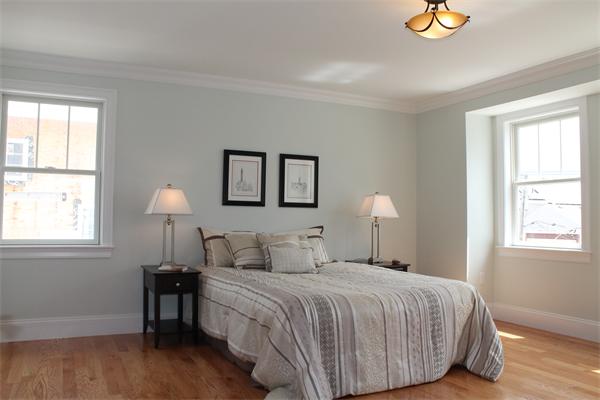 153 Jericho Road, Unit 1 Scituate, MA 02066 - Photo 12 of 26 a bedroom with a bed and a window