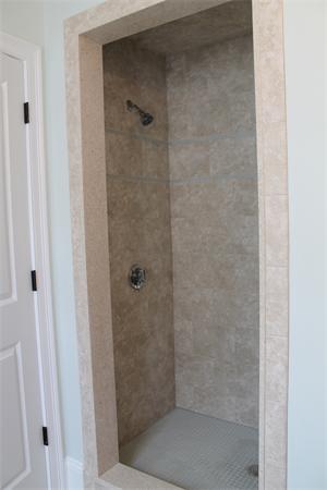 153 Jericho Road, Unit 1 Scituate, MA 02066 - Photo 14 of 26 a bathroom with a glass shower door