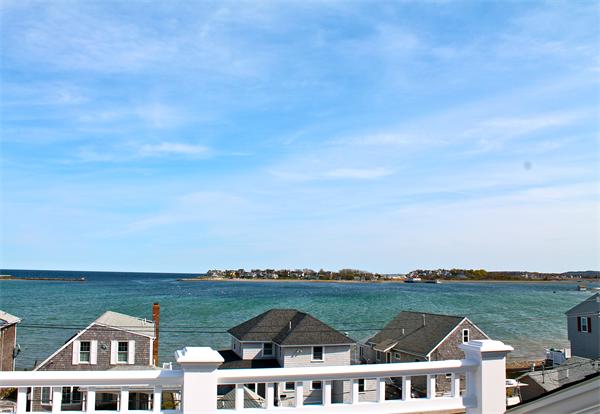153 Jericho Road, Unit 1 Scituate, MA 02066 - Photo 2 of 26 an aerial view of a house with a lake view
