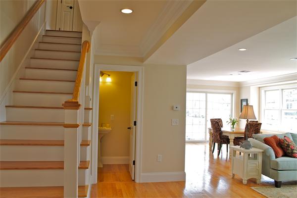 153 Jericho Road, Unit 1 Scituate, MA 02066 - Photo 5 of 26 a view of a living room and entryway
