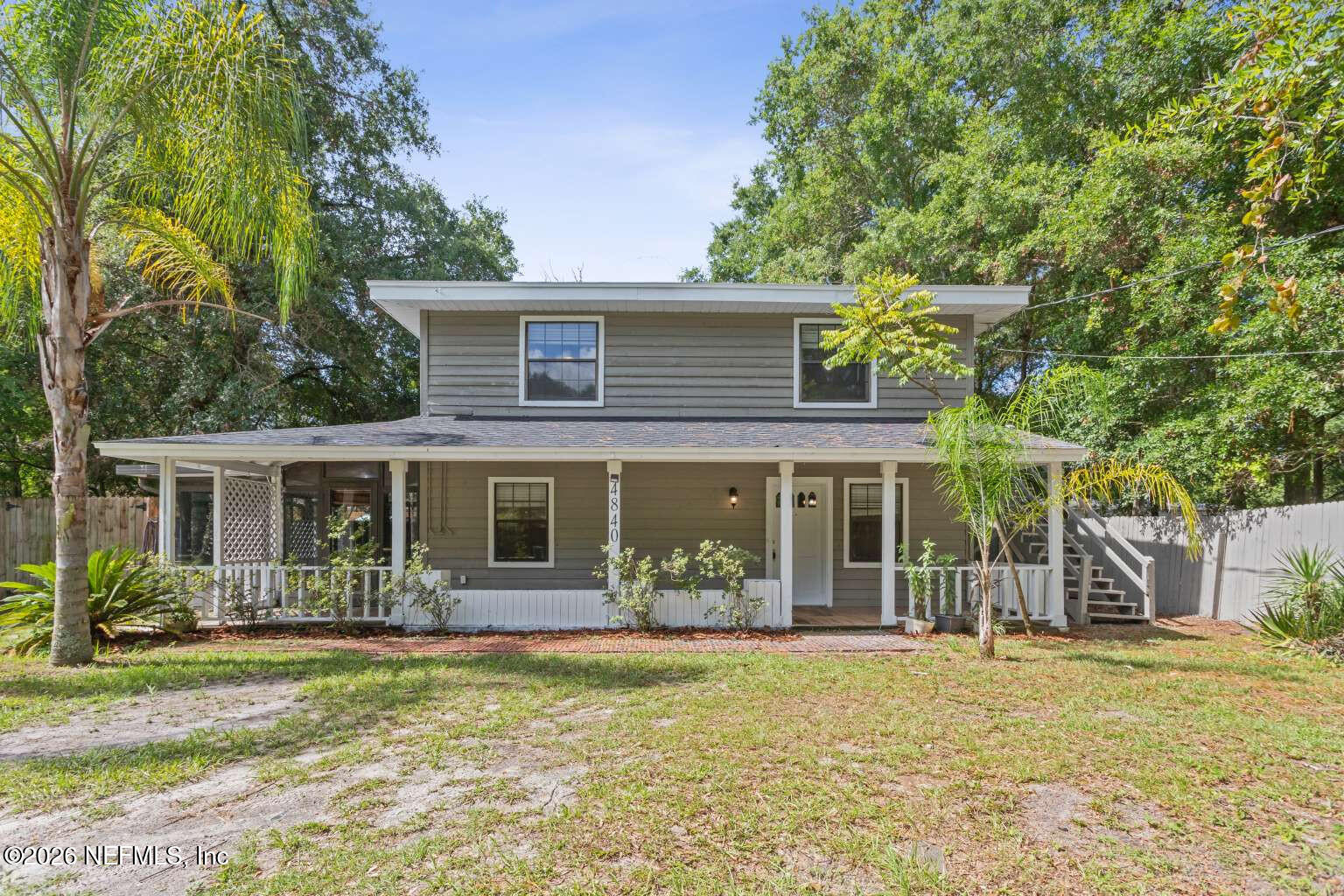 front view of a house with a yard