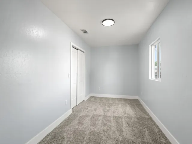 an empty room with a window