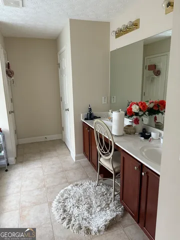 a room with a table and chairs